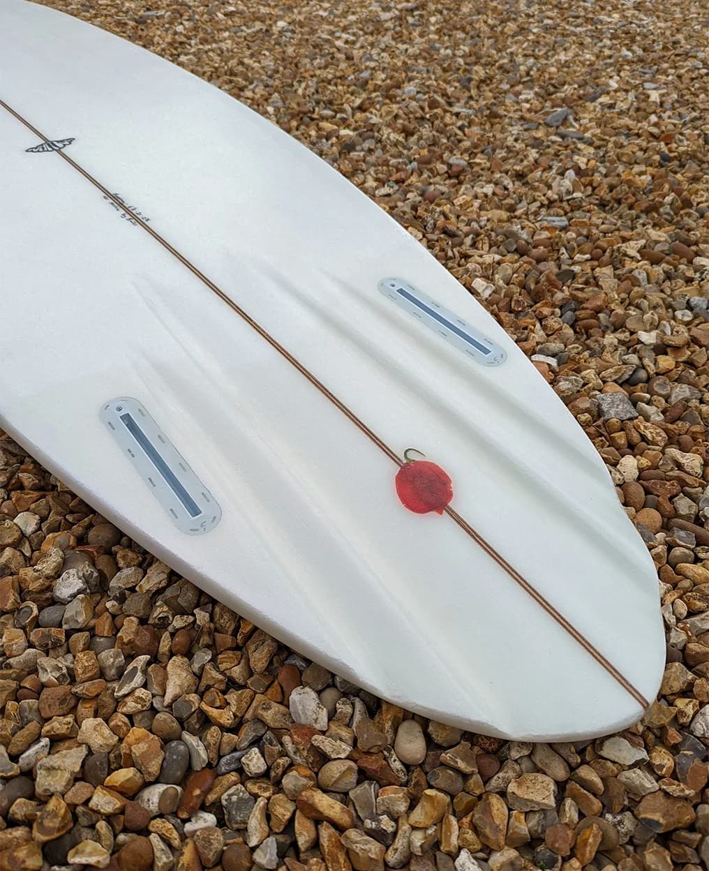 Eggspiracy surfboard finish detail by Whitburn Studio.