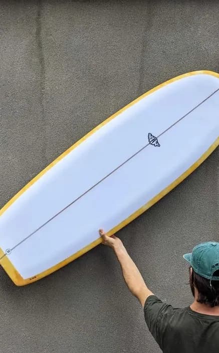 Kernel twin fin surfboard shape by Whitburn Studio.