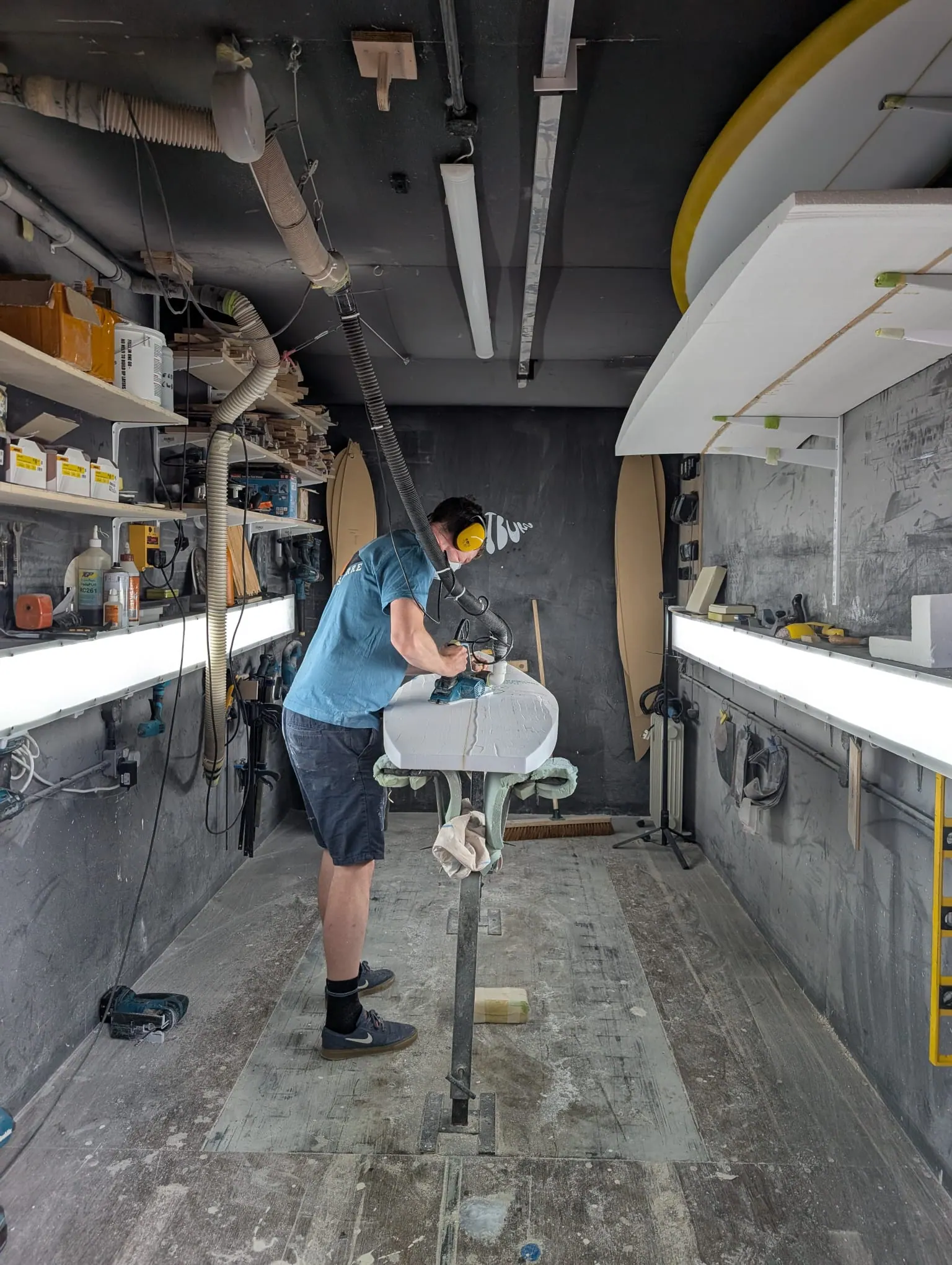 A surfboard shaping experience in the Whitburn Studio workshop.