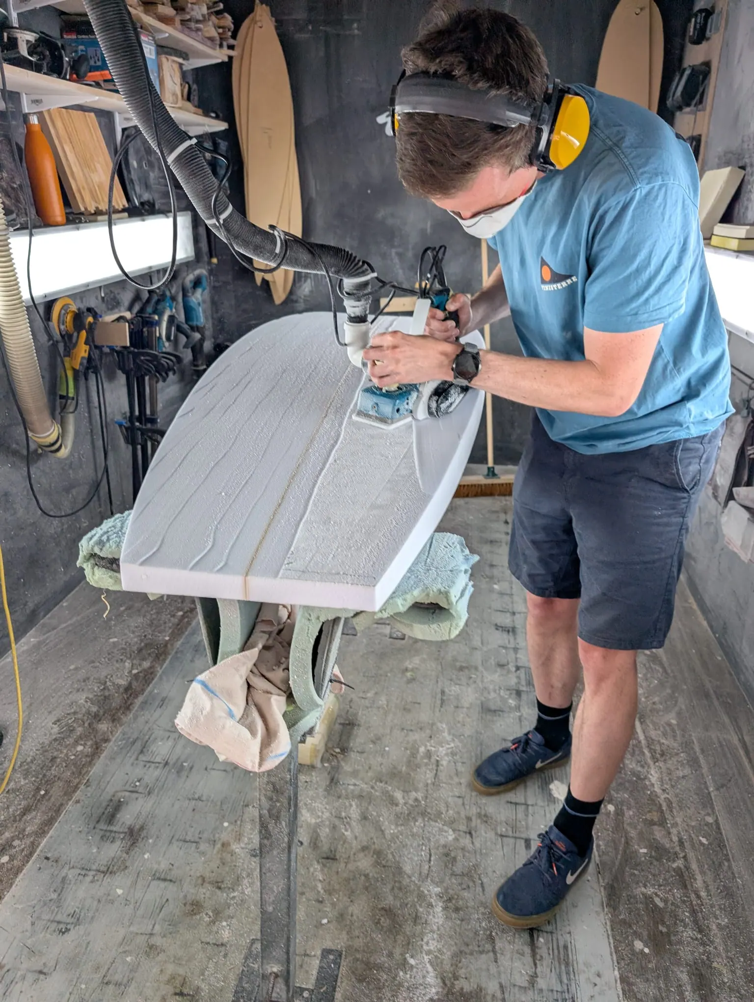A board being shaped on the workshop stand.